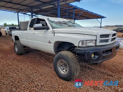 Czwarte zdjęcie samochodu z boku: 2000 DODGE RAM 2500 VIN:3B7KF2366YG136028 - miniatura