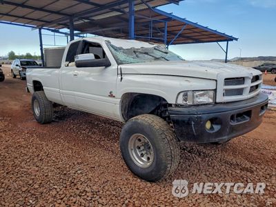 Czwarte zdjęcie samochodu z boku: 2000 DODGE RAM 2500 VIN:3B7KF2366YG136028 - miniatura