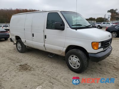 Czwarte zdjęcie samochodu z boku: 1999 FORD ECONOLINE E350 SUPER DUTY VAN VIN:1FTSE34L4XHB18497 - miniatura