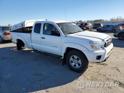 Czwarte zdjęcie samochodu z boku: 2015 TOYOTA TACOMA ACCESS CAB VIN:5TFUU4EN5FX123858 - miniatura