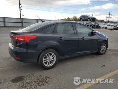 Trzecie zdjęcie samochodu z tyłu: 2016 FORD FOCUS SE VIN:1FADP3F23GL377833 - miniatura