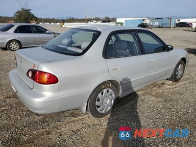 Trzecie zdjęcie samochodu z tyłu: 2002 TOYOTA COROLLA CE VIN:1NXBR12E02Z644120 - miniatura