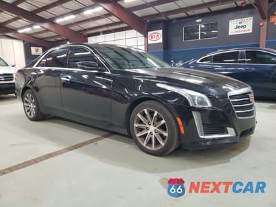 Czwarte zdjęcie samochodu z boku: 2016 CADILLAC CTS LUXURY COLLECTION VIN:1G6AX5SX5G0194884 - miniatura