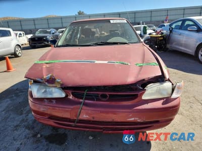 Piąte zdjęcie samochodu w środku: 1999 TOYOTA COROLLA VE VIN:1NXBR12E1XZ215334 - miniatura
