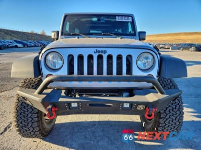 Piąte zdjęcie samochodu w środku: 2013 JEEP WRANGLER UNLIMITED SPORT VIN:1C4HJWDG6DL682350 - miniatura