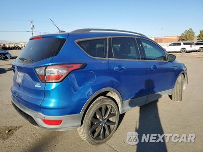 Trzecie zdjęcie samochodu z tyłu: 2017 FORD ESCAPE SE VIN:1FMCU0GD7HUC24649 - miniatura