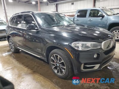 Czwarte zdjęcie samochodu z boku: 2015 BMW X5 XDRIVE50I VIN:5UXKR6C56F0J78141 - miniatura