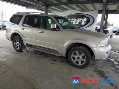 Czwarte zdjęcie samochodu z boku: 2004 LINCOLN AVIATOR VIN:5LMEU88H84ZJ07567 - miniatura