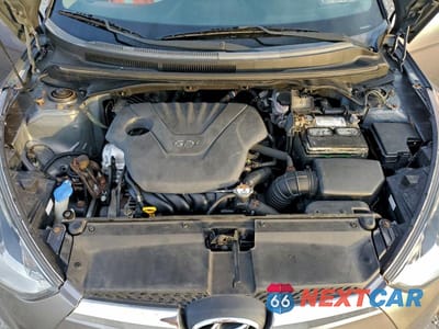 Zdjęcie 11 z 12 samochodu: 2013 HYUNDAI VELOSTER VIN:KMHTC6AD0DU093198 - miniatura