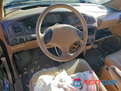 Zdjęcie 8 z 14 samochodu: 1999 CHRYSLER TOWN & COUNTRY LX VIN:1C4GT54LXXB567726 - miniatura