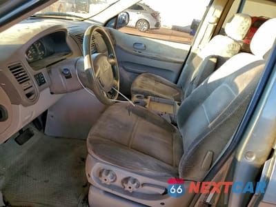 Zdjęcie 7 z 15 samochodu: 2004 KIA SEDONA EX VIN:KNDUP131646597732 - miniatura