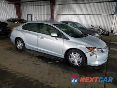 Czwarte zdjęcie samochodu z boku: 2012 HONDA CIVIC HYBRID L VIN:JHMFB4F37CS002767 - miniatura