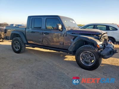 Czwarte zdjęcie samochodu z boku: 2023 JEEP GLADIATOR RUBICON VIN:1C6JJTBGXPL585876 - miniatura