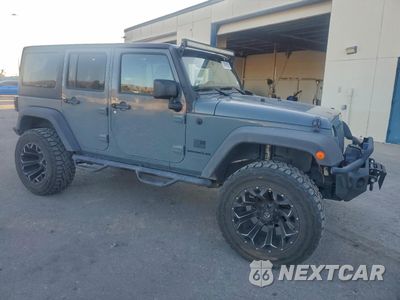 Czwarte zdjęcie samochodu z boku: 2015 JEEP WRANGLER UNLIMITED SPORT VIN:1C4BJWDG0FL547499 - miniatura