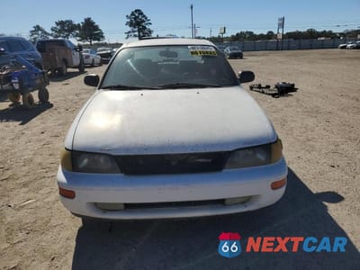 Piąte zdjęcie samochodu w środku: 1994 TOYOTA COROLLA DX VIN:JT2AE09B8R0070667 - miniatura