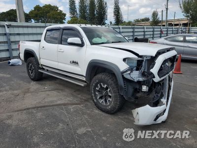Czwarte zdjęcie samochodu z boku: 2016 TOYOTA TACOMA DOUBLE CAB VIN:3TMAZ5CN5GM016832 - miniatura