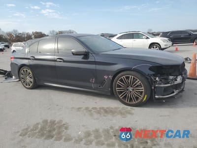 Czwarte zdjęcie samochodu z boku: 2018 BMW M550XI VIN:WBAJB9C50JG463806 - miniatura