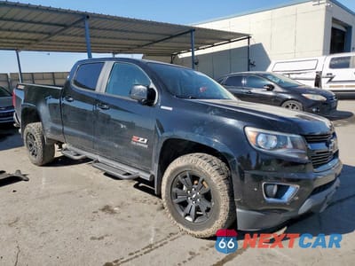 Czwarte zdjęcie samochodu z boku: 2016 CHEVROLET COLORADO Z71 VIN:1GCPTDE1XG1353610 - miniatura