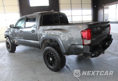 Czwarte zdjęcie samochodu z boku: 2017 TOYOTA TACOMA DOUBLE CAB VIN:3TMCZ5AN7HM094624 - miniatura