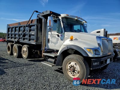 Czwarte zdjęcie samochodu z boku: 2005 INTERNATIONAL 7500 DUMP TRUCK VIN:1HTWPAZT85J005654 - miniatura