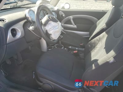Zdjęcie 7 z 13 samochodu: 2006 MINI COOPER VIN:WMWRC33516TK64095 - miniatura