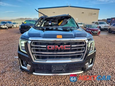 Piąte zdjęcie samochodu w środku: 2021 GMC YUKON SLT VIN:1GKS2BKD3MR144078 - miniatura