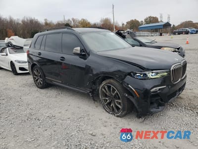 Czwarte zdjęcie samochodu z boku: 2022 BMW X7 M50I VIN:5UXCX6C04N9J22319 - miniatura