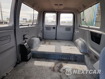 Zdjęcie 10 z 15 samochodu: 1999 FORD ECONOLINE E150 WAGON VIN:1FMRE11L9XHA28314 - miniatura