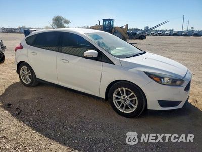 Czwarte zdjęcie samochodu z boku: 2015 FORD FOCUS SE VIN:1FADP3K28FL232050 - miniatura