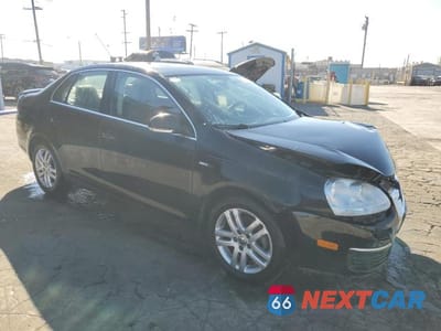 Czwarte zdjęcie samochodu z boku: 2007 VOLKSWAGEN JETTA WOLFSBURG VIN:3VWEF71K97M183254 - miniatura