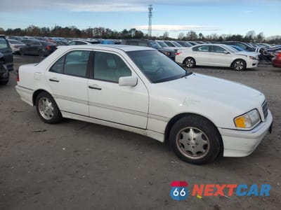Czwarte zdjęcie samochodu z boku: 1999 MERCEDES-BENZ C 230 VIN:WDBHA24G1XA799003 - miniatura