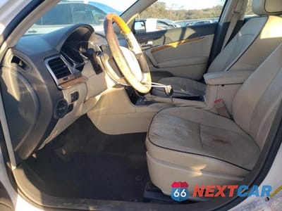 Zdjęcie 7 z 12 samochodu: 2011 LINCOLN MKZ VIN:3LNHL2GCXBR765351 - miniatura