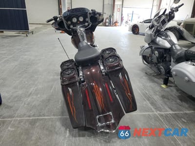 Czwarte zdjęcie samochodu z boku: 2011 HARLEY-DAVIDSON FLHX VIN:1HD1KBM16BB654049 - miniatura