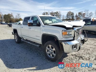 Czwarte zdjęcie samochodu z boku: 2017 GMC SIERRA K2500 SLT VIN:1GT12TEG6HF176551 - miniatura