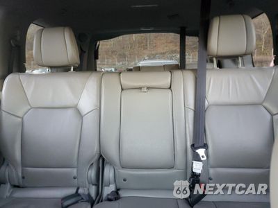 Zdjęcie 10 z 14 samochodu: 2013 HONDA PILOT TOURING VIN:5FNYF4H99DB080420 - miniatura