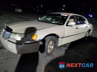 1999 LINCOLN TOWN CAR CARTIER 1LNHM83W7XY691721 - główne zdjęcie licytacji z USA - miniatura