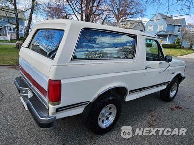 Czwarte zdjęcie samochodu z boku: 1989 FORD BRONCO U100 VIN:1FMEU15N3KLB09036 - miniatura