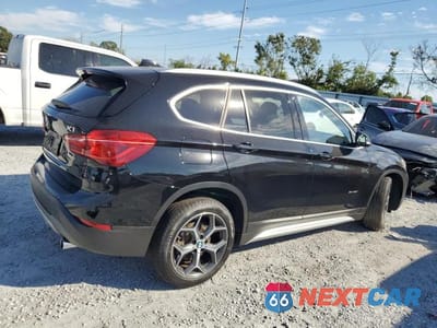 Trzecie zdjęcie samochodu z tyłu: 2018 BMW X1 SDRIVE28I VIN:WBXHU7C3XJ5H44771 - miniatura