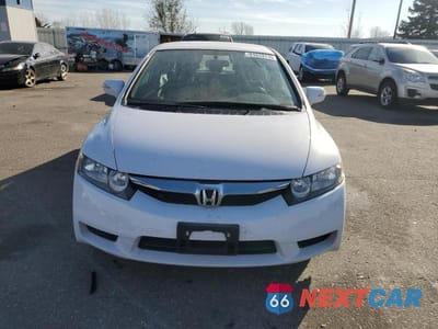 Piąte zdjęcie samochodu w środku: 2010 HONDA CIVIC VIN:JHMFA3F2XAS007334 - miniatura