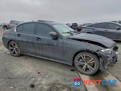 Czwarte zdjęcie samochodu z boku: 2022 BMW 330I VIN:3MW5R1J04N8C34264 - miniatura