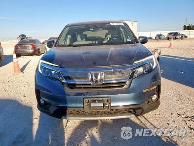 Piąte zdjęcie samochodu w środku: 2022 HONDA PILOT EXL VIN:5FNYF5H55NB009204 - miniatura