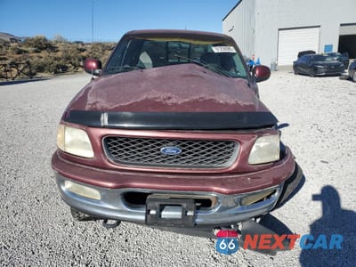 Piąte zdjęcie samochodu w środku: 1998 FORD F150 VIN:1FTZX18W2WKA25402 - miniatura