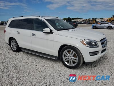 Czwarte zdjęcie samochodu z boku: 2016 MERCEDES-BENZ GL 450 4MATIC VIN:4JGDF6EE7GA661595 - miniatura