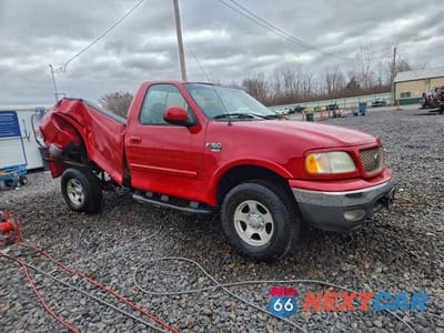 Czwarte zdjęcie samochodu z boku: 2002 FORD F150 VIN:2FTRF18LX2CA48918 - miniatura