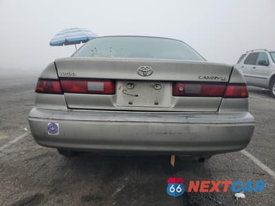 Zdjęcie 6 z 12 samochodu: 1997 TOYOTA CAMRY LE VIN:JT2BG22K3V0100897 - miniatura