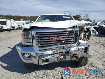 Piąte zdjęcie samochodu w środku: 2017 GMC SIERRA K2500 SLT VIN:1GT12TEG6HF176551 - miniatura