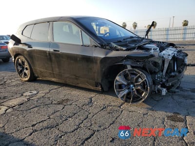 Czwarte zdjęcie samochodu z boku: 2024 BMW IX XDRIVE50 VIN:WB523CF04RCN52035 - miniatura