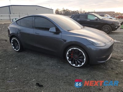Czwarte zdjęcie samochodu z boku: 2022 TESLA MODEL Y VIN:7SAYGDEF5NF373856 - miniatura