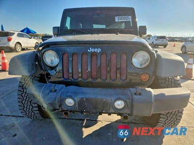 Piąte zdjęcie samochodu w środku: 2011 JEEP WRANGLER UNLIMITED RUBICON VIN:1J4BA6H13BL580118 - miniatura