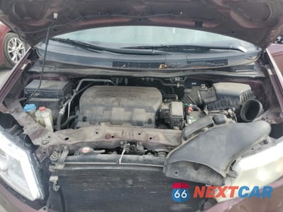 Zdjęcie 12 z 15 samochodu: 2013 HONDA ODYSSEY EXL VIN:5FNRL5H66DB011466 - miniatura
